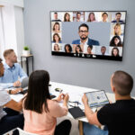co-workers having a video conference with other people