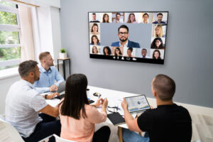co-workers having a video conference with other people